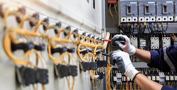 Professional Electrician technician working in Winter Beach, FL
